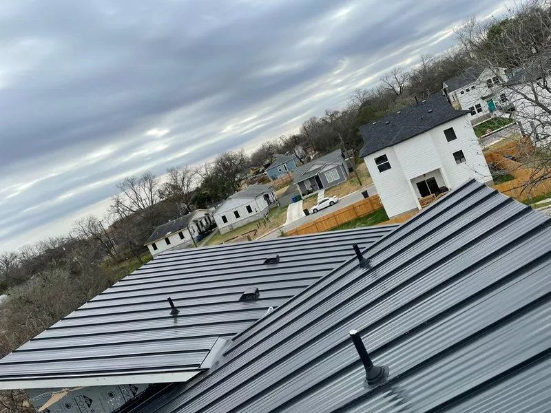 Standing seam metal roof panels with vents for Skylight Repair in Highwood